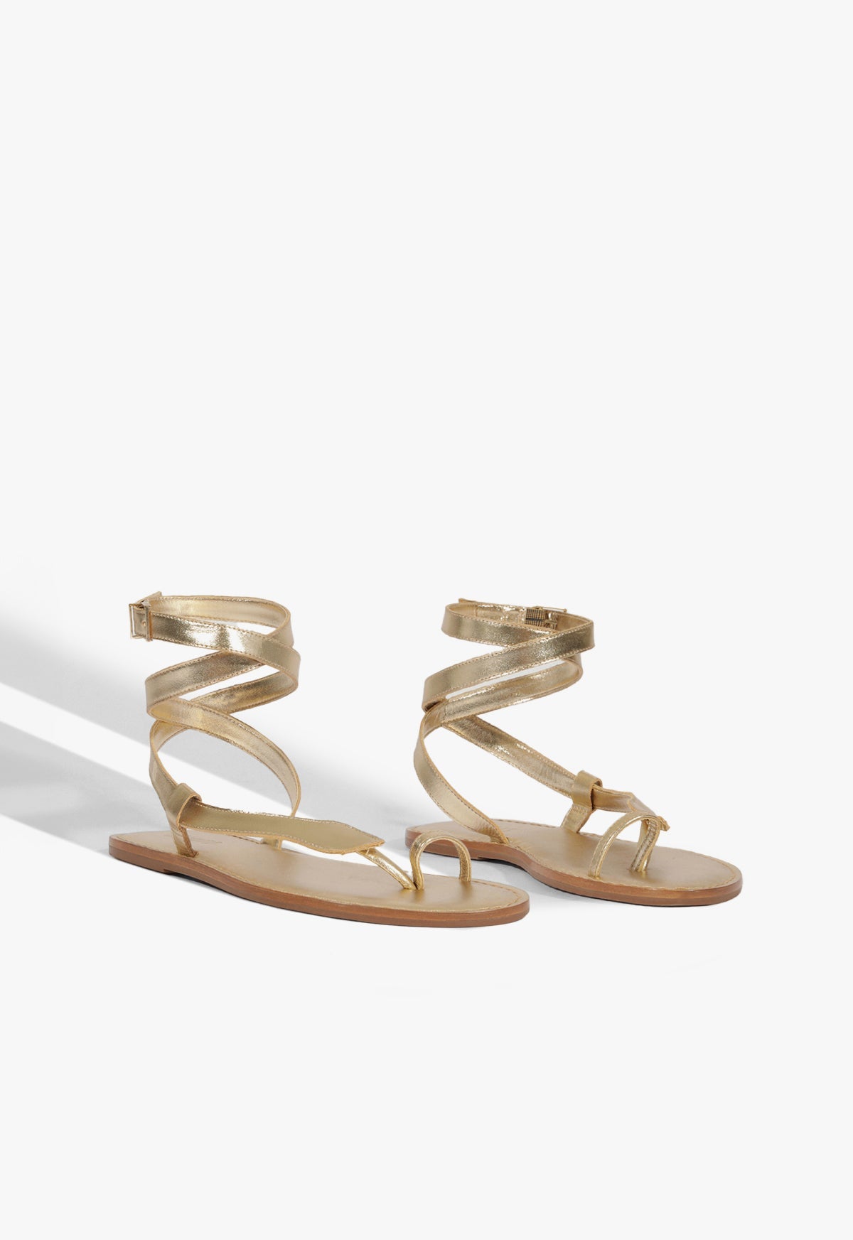 256771-schutz-cleo-flat-sandal-in-platina-1