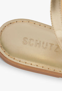 256771-schutz-cleo-flat-sandal-in-platina-1