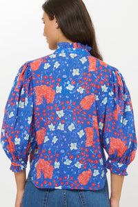 3140M1-oliphant-ruffle-front-button-down-blouse-in-fleur-blue-1