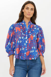 3140M1-oliphant-ruffle-front-button-down-blouse-in-fleur-blue-1