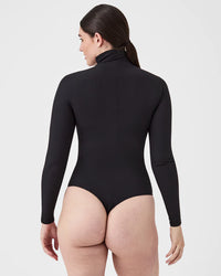 Suit Yourself Ribbed Long Sleeve Turtleneck Bodysuit in Black