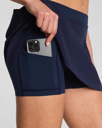 51193R-spanx-pleated-skort-in-timeless-navy-1