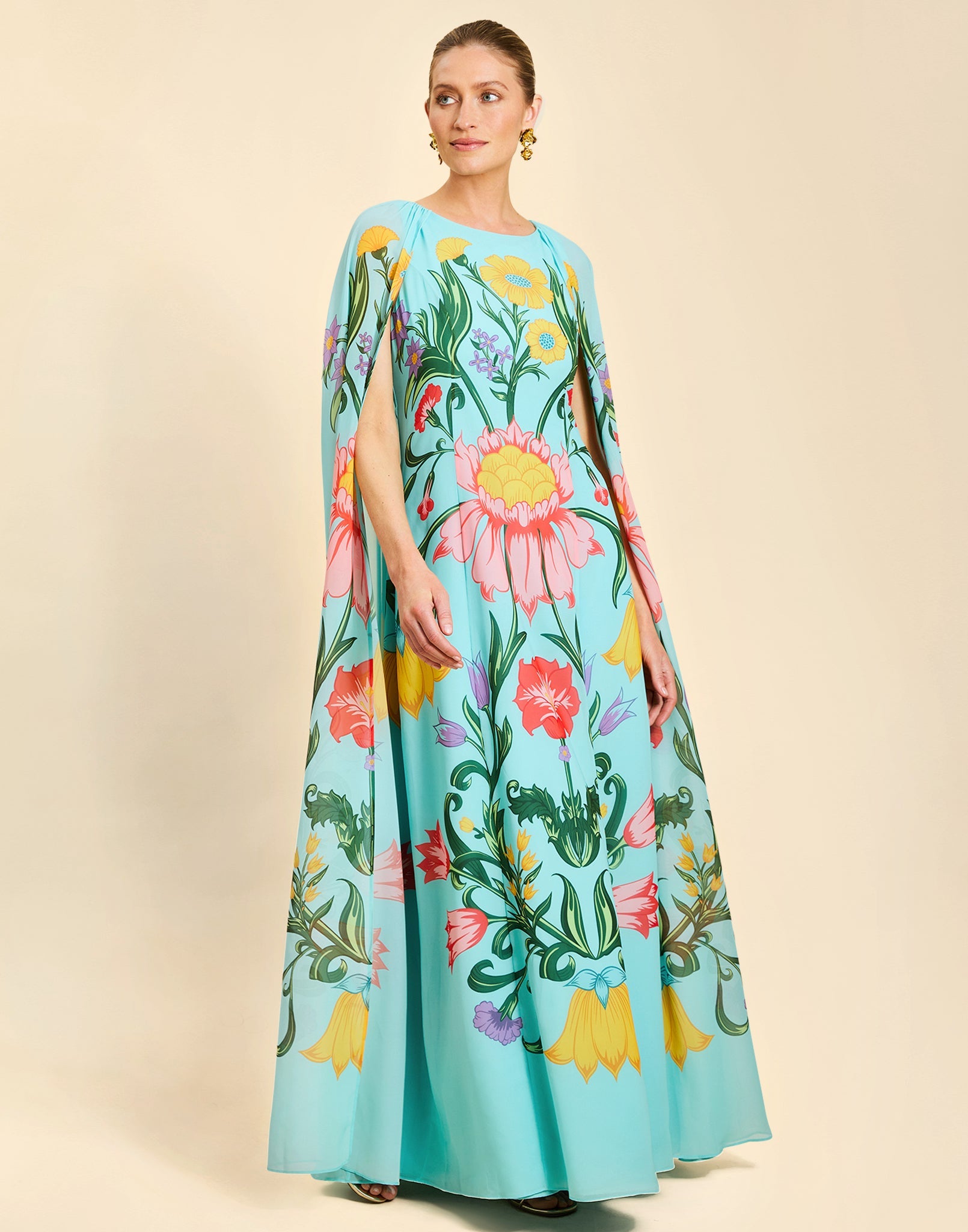 7473319084126-mestiza-cartagena-cape-gown-in-sean-juan-garden-1