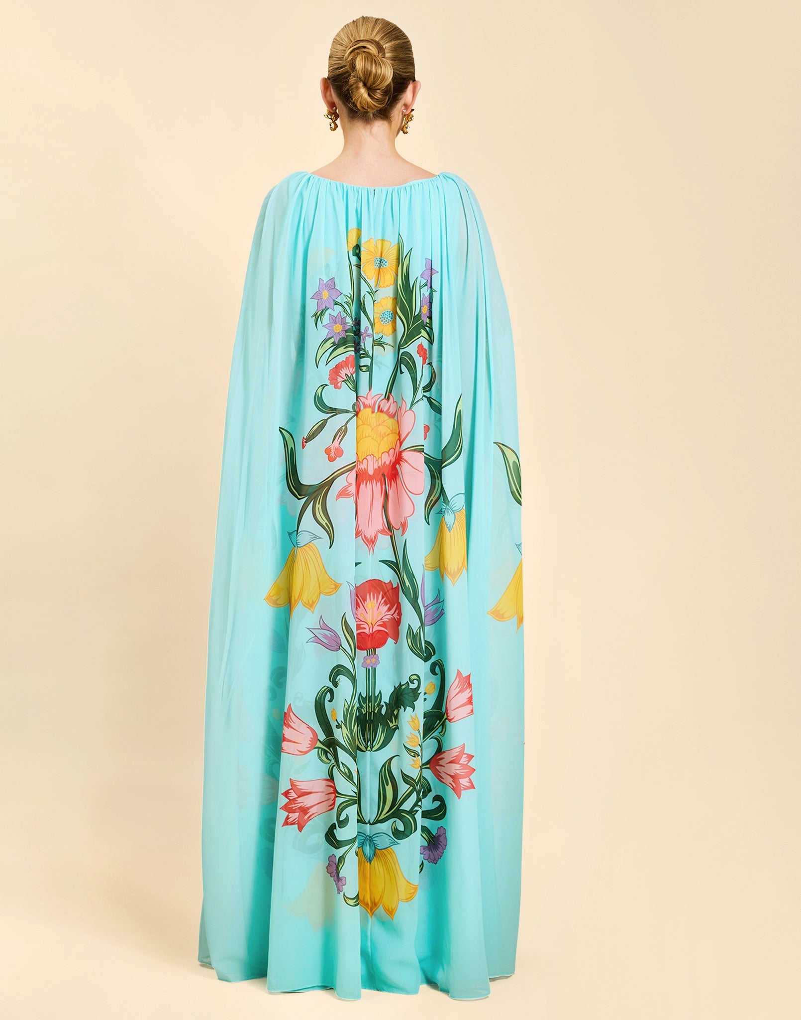 7473319084126-mestiza-cartagena-cape-gown-in-sean-juan-garden-1