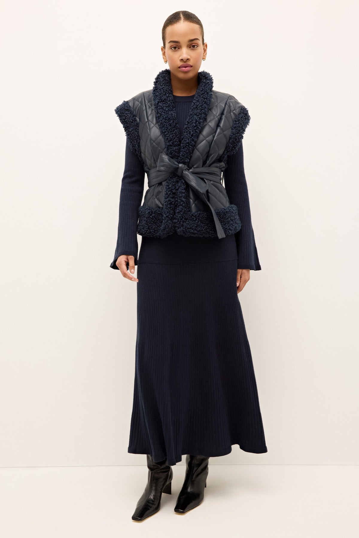 855-306B-108-marie-oliver-beatrice-quilted-vegan-leather-vest-with-sherpa-naval-1