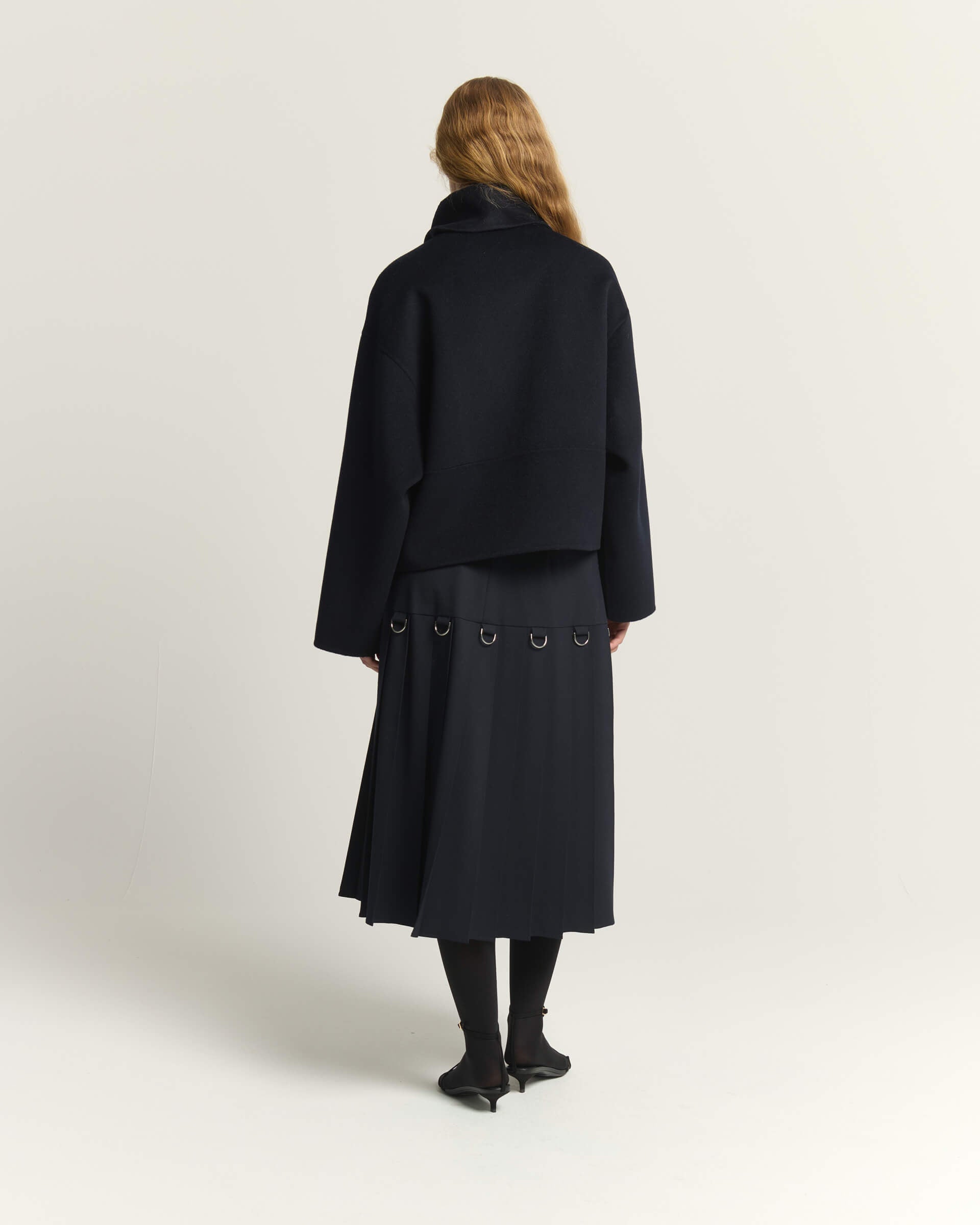 AB2C5004DER-beatrice-pleated-d-ring-detail-skirt-in-dark-blue-1