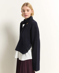 AB2C8760ROUCHES-beatrice-v-neck-sweater-with-ruffle-details-and-layered-hem-in-dark-blue-1
