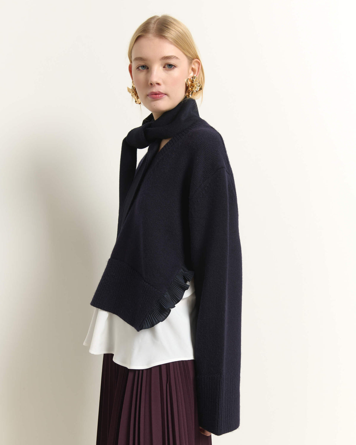 AB2C8760ROUCHES-beatrice-v-neck-sweater-with-ruffle-details-and-layered-hem-in-dark-blue-1