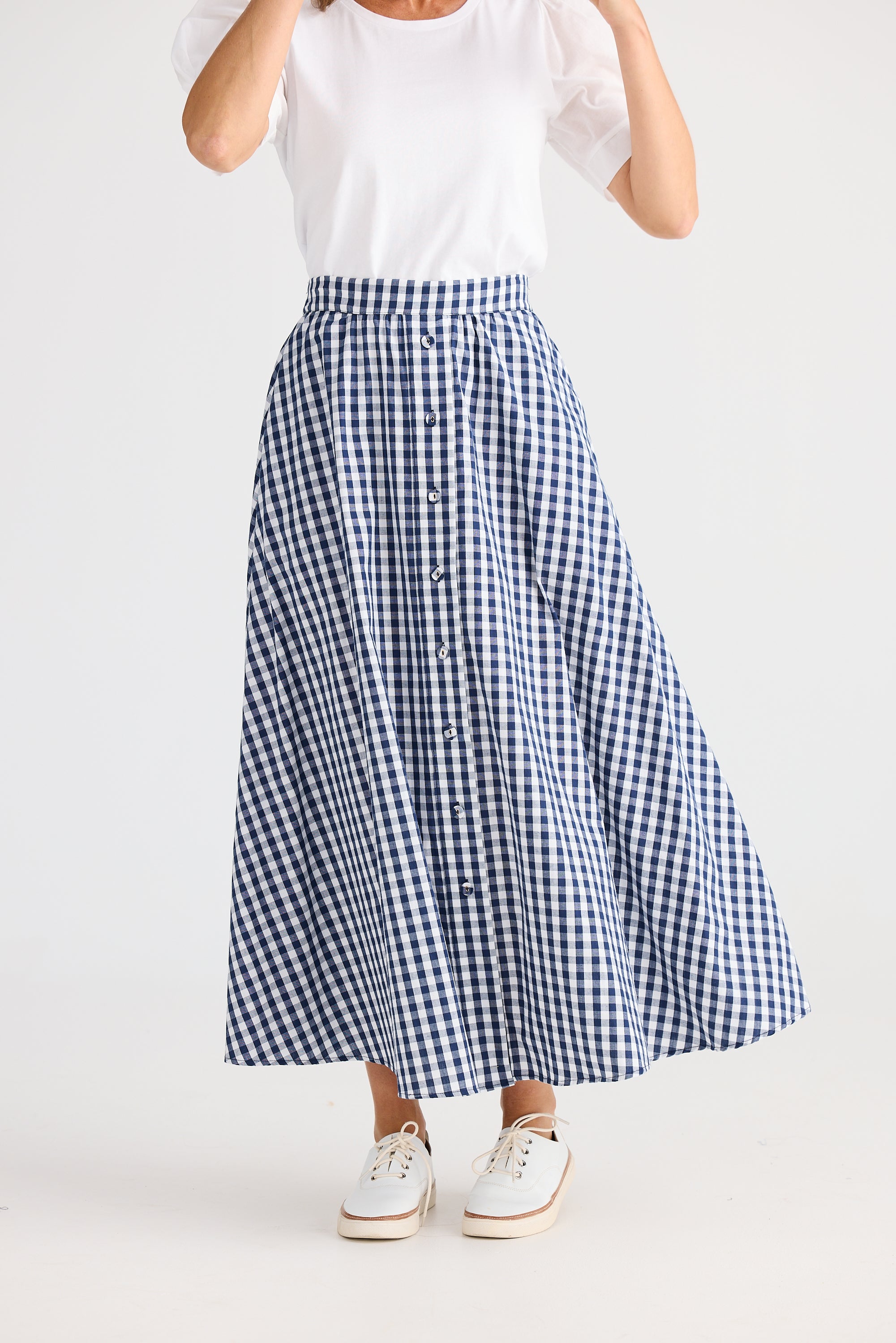 BT25384-brave-and-true-lucy-midi-skirt-in-navy-gingham-1