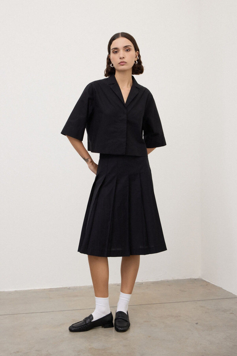 DN6294-ottod'ame-pleated-midi-skirt-in-black-1-DC5268-ottod'ame-cropped-button-front-top-in-black-1