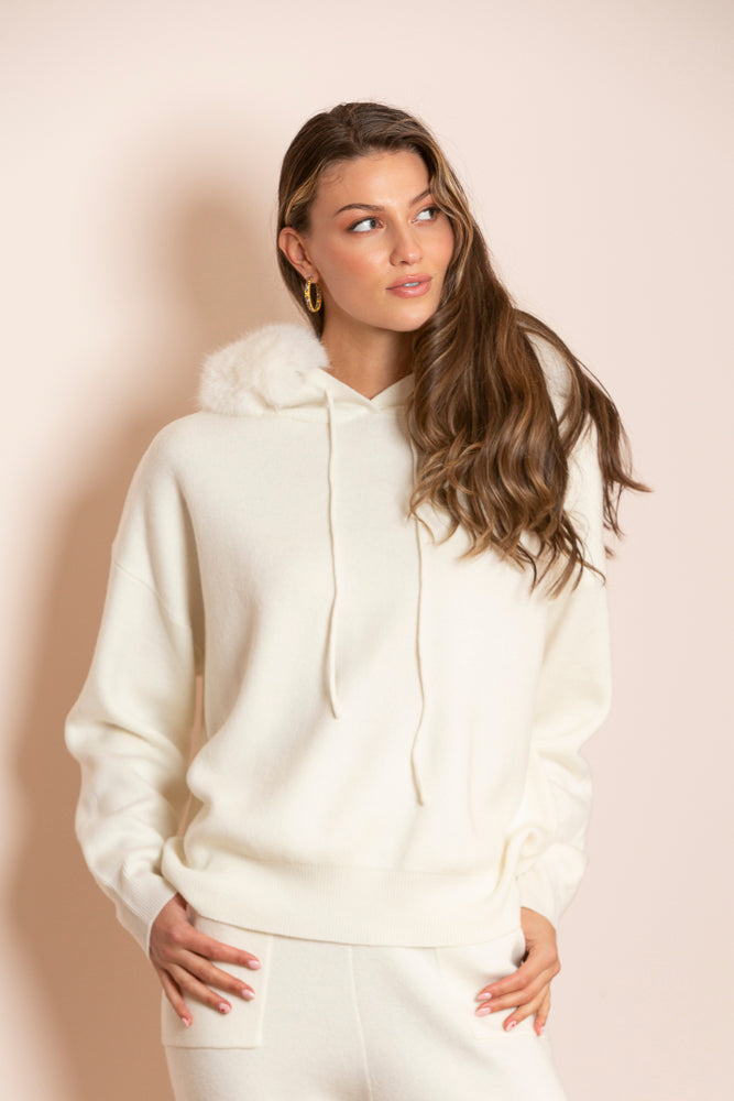 FW24K114B-jessie-liu-madilyn-hooded-sweater-with-detachable-faux-fur-trim-in-ivory-1