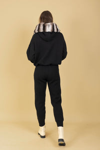 FW25K125A-jessie-liu-hooded-sweater-with-detachable-genuine-fur-trim-in-black-1