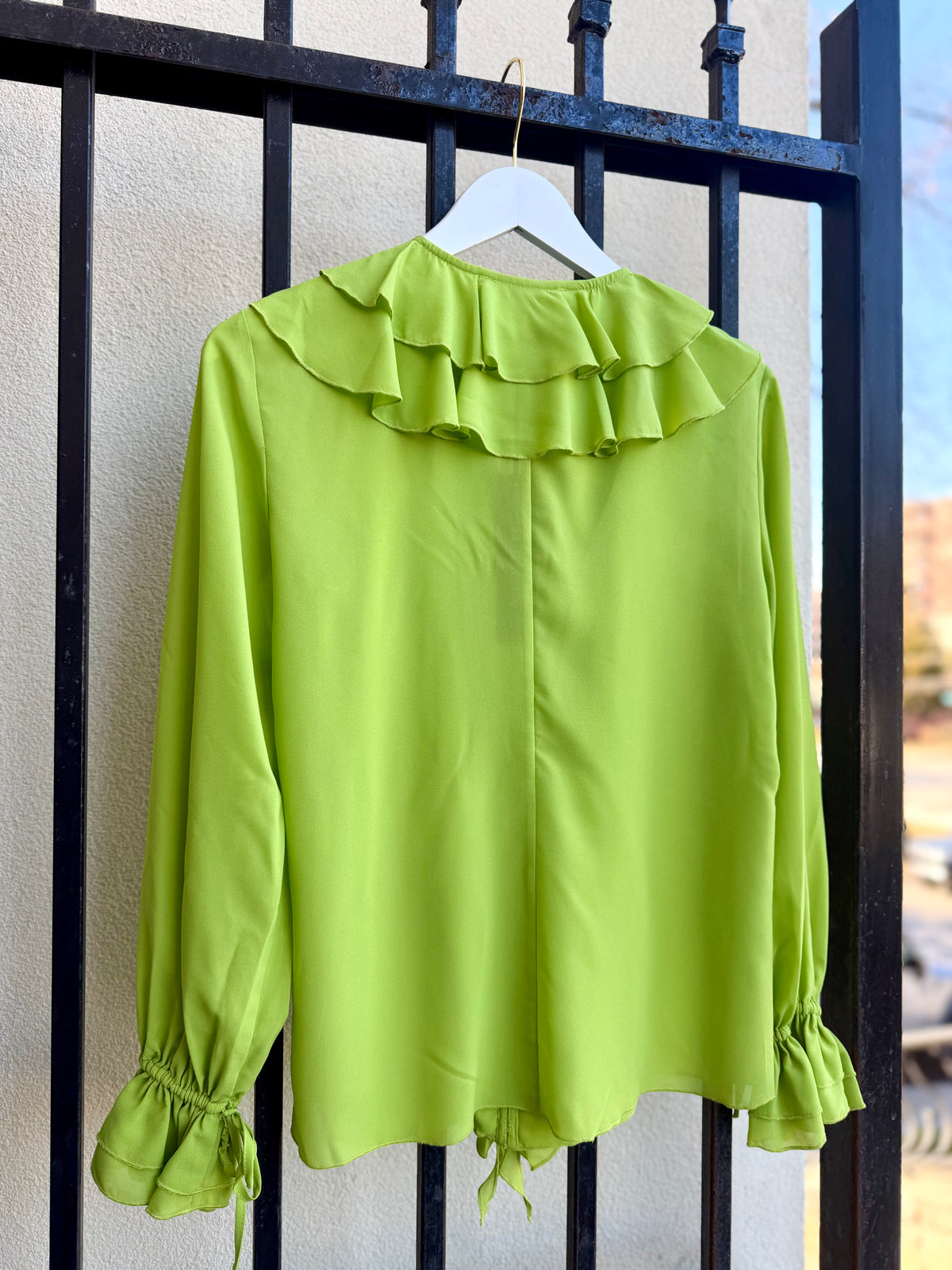 TS6514T093-toccin-tobi-ruffle-blouse-in-lime-1