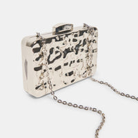 dolce-vita-delia-metal-clutch-in-silver-1