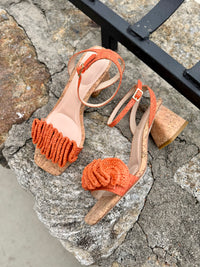 pelle-moda-tiann-raffia-rosette-ankle-strap-sandal-in-tangerine-linen-1