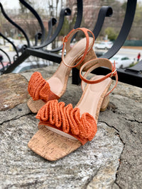 pelle-moda-tiann-raffia-rosette-ankle-strap-sandal-in-tangerine-linen-1