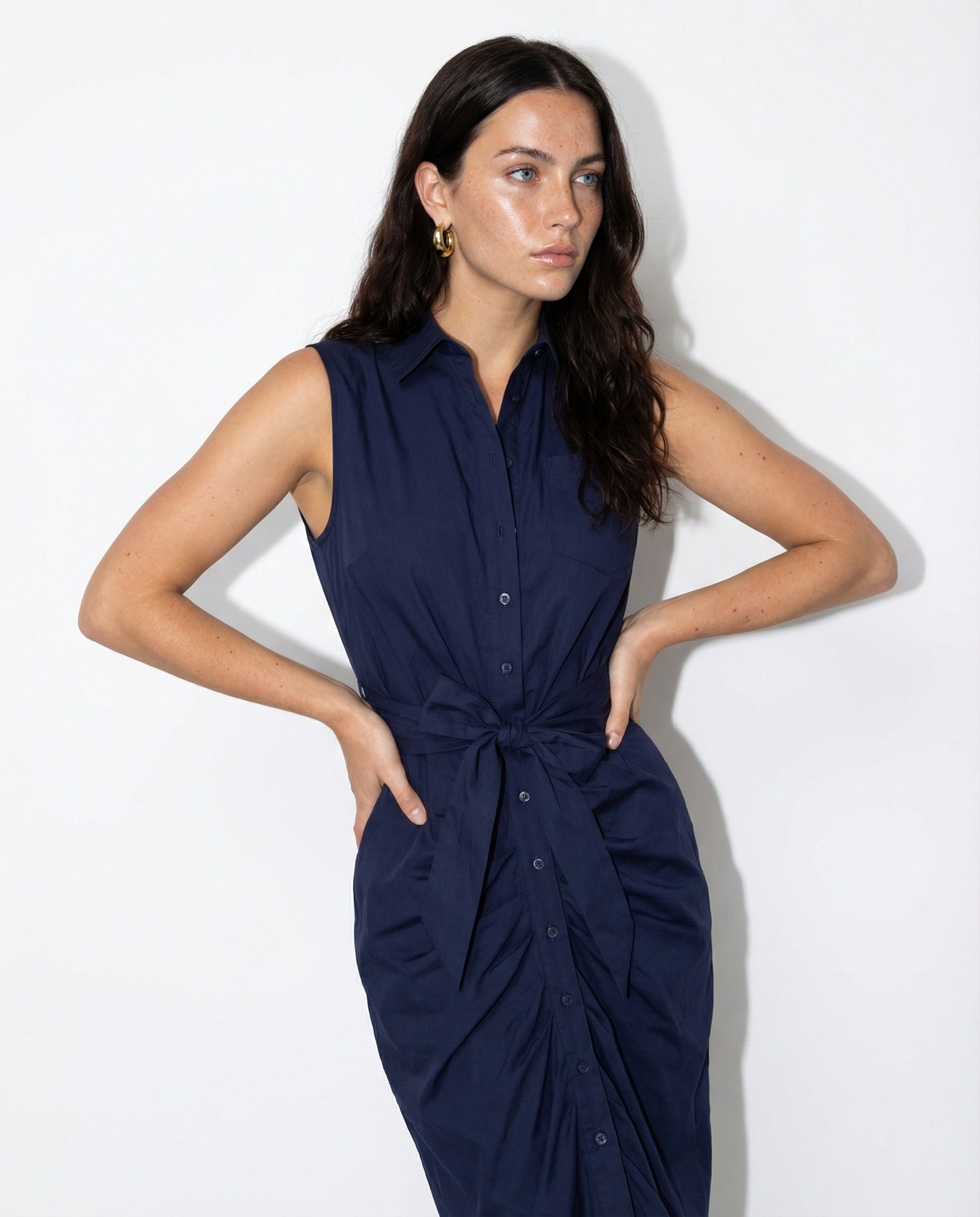 the-shirt-by-rochelle-beherns-sleeveless-wrap-front-dress-in-navy-1